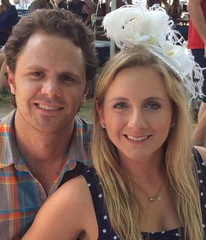 author tim tobin and his wife lauren at the race course