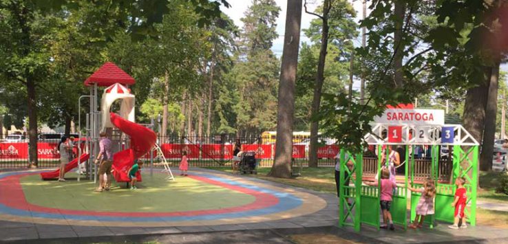 Kids play at the Saratoga Family Zone playground at Saratoga Race Course